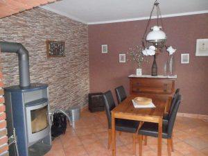 Ferienhaus Deichwiese Esszimmer mit Kamin